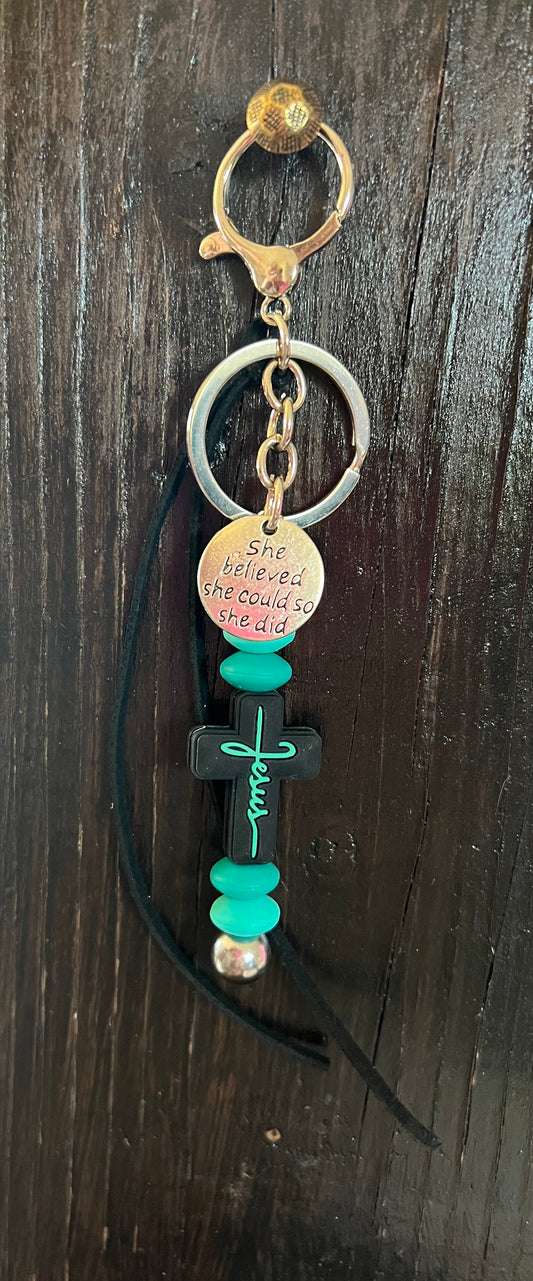 “Jesus” saddle charm (Black cross, turquoise beads)