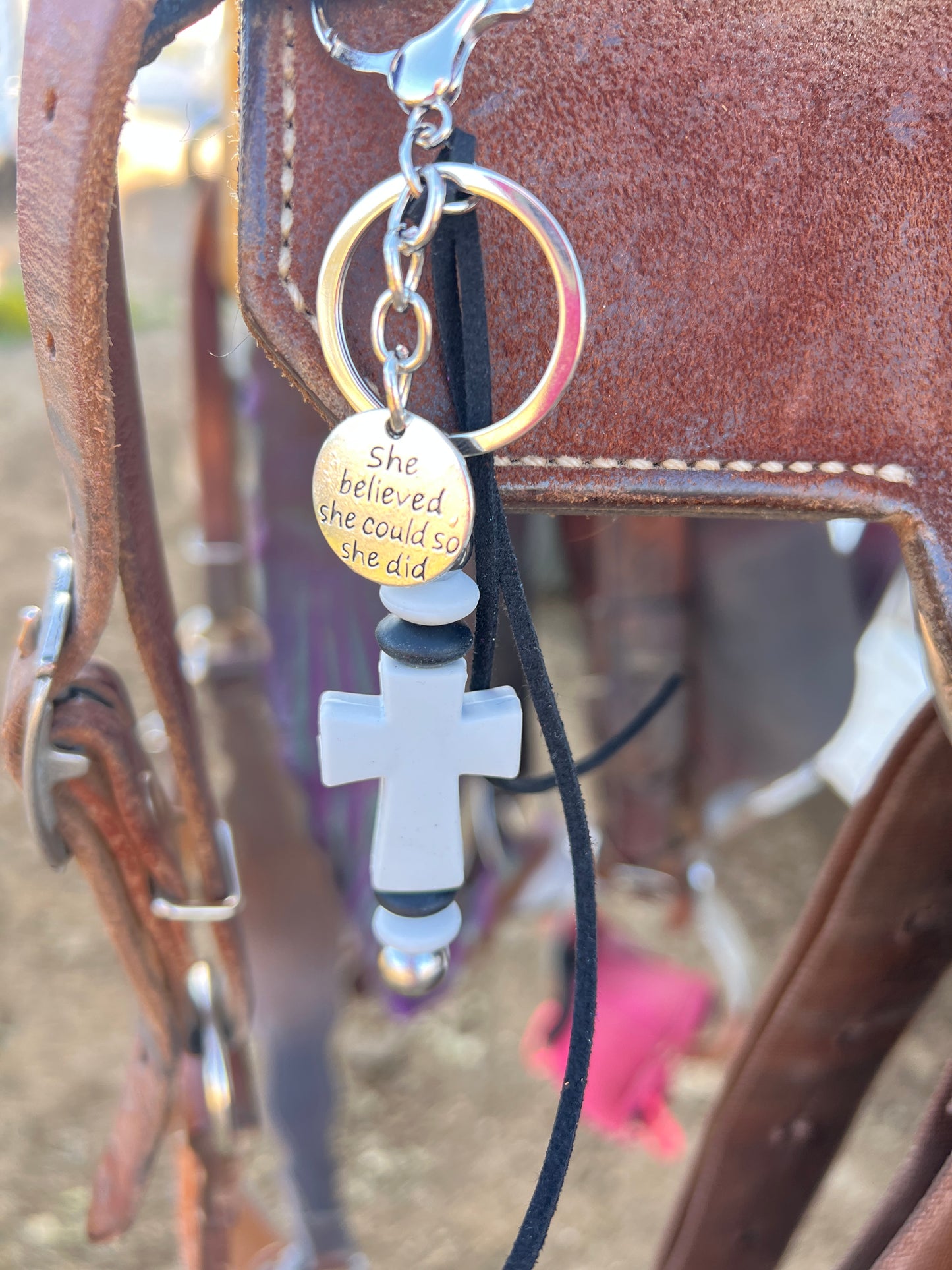 Cross saddle charm (light gray cross, black and gray beads)