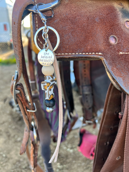 Cheetah print cross saddle charm (tan and black beads)