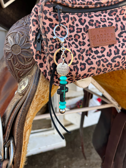 “Jesus” saddle charm (Black cross, turquoise beads)