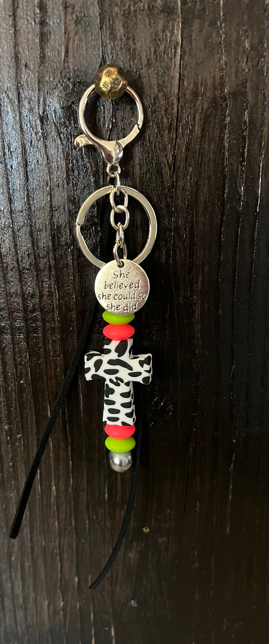 Cow print cross saddle charm (neon green and orange beads)