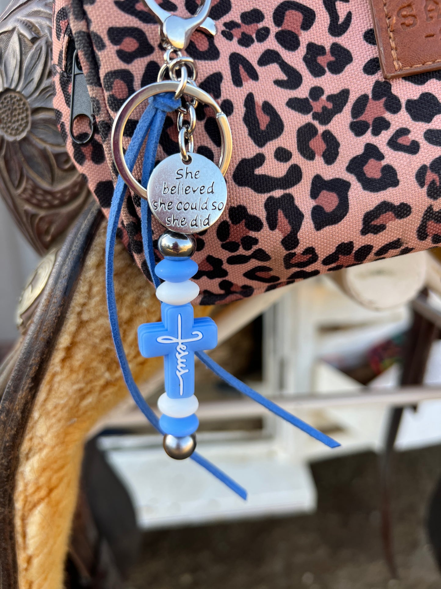 “Jesus” saddle charm (blue cross, blue and white beads)