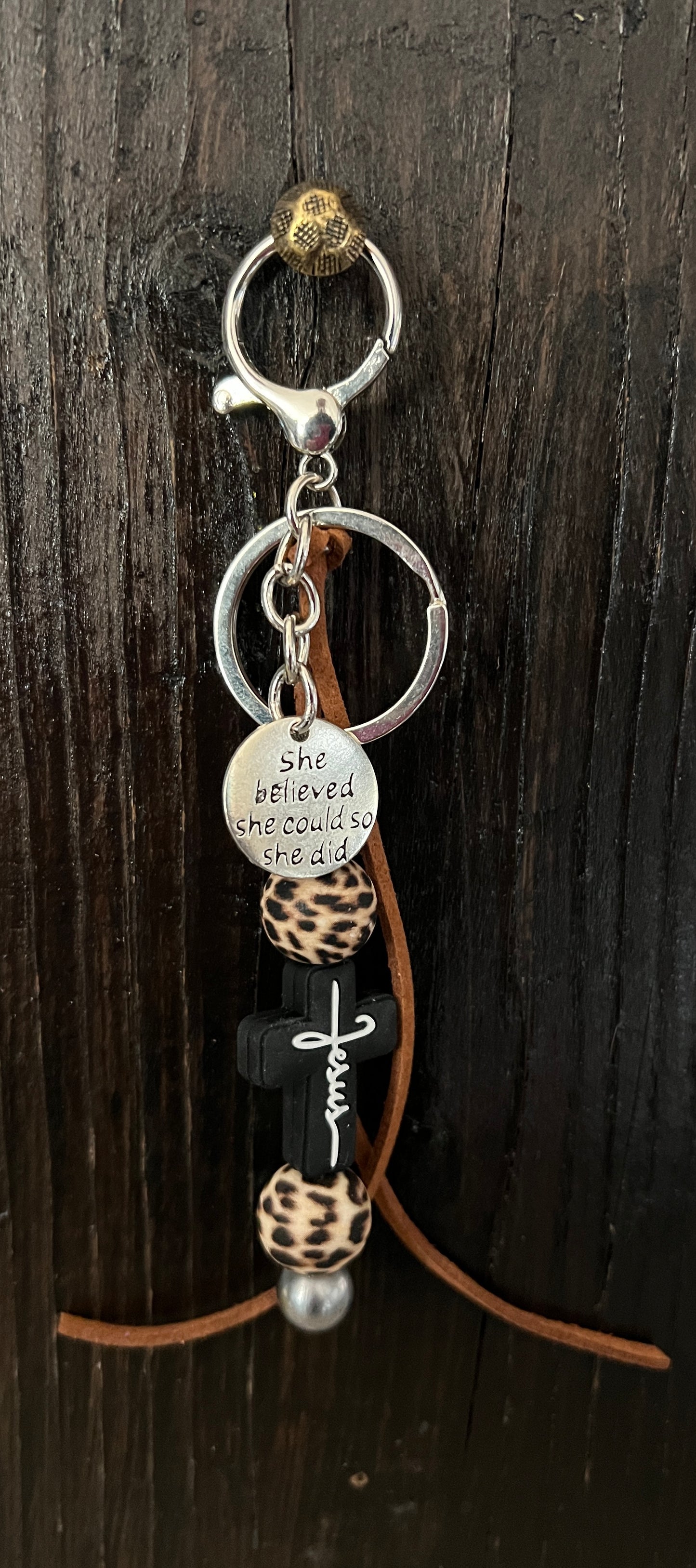 “Jesus” saddle charm (Black cross/cheetah beads)