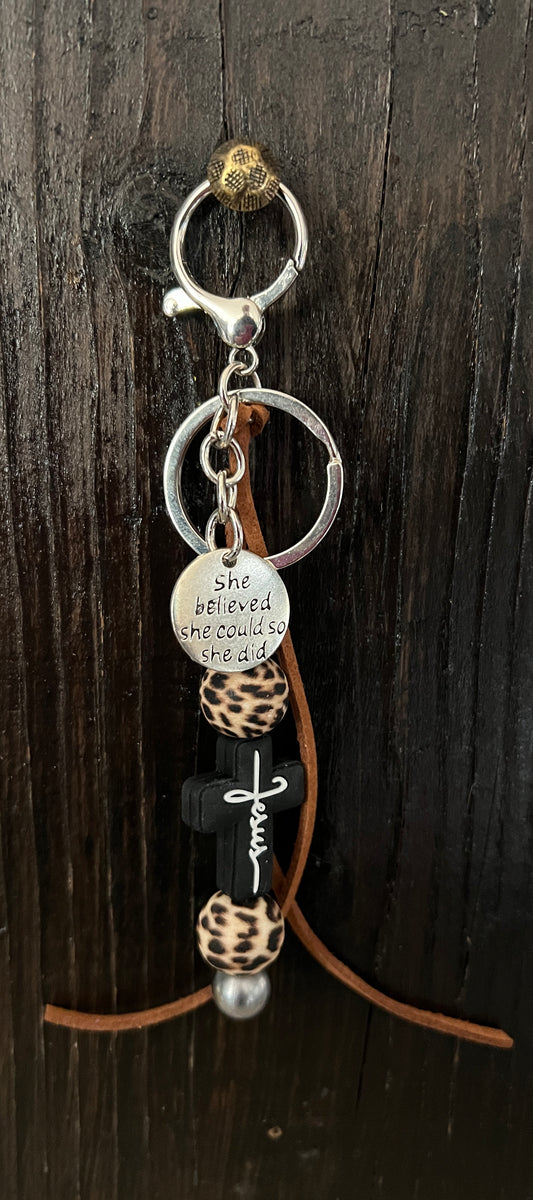 “Jesus” saddle charm (Black cross/cheetah beads)